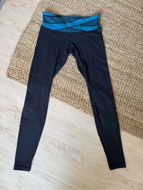 Lululemon size 8 Leggings with Teal Waistband